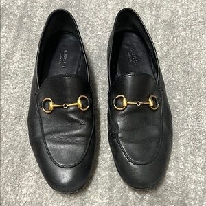 Gucci Black and Gold Loafers with Horsebit Detail